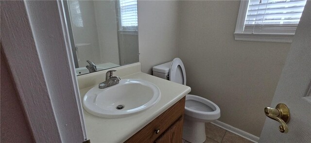 146 Don El St, Brunswick, GA 31523 - bathroom with healthy amount of natural light, vanity, and tile patterned floors