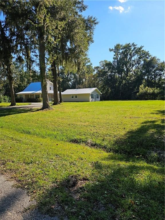 146 Don El St, Brunswick, GA 31523 - view of grassy yard