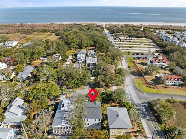 birds eye view of property featuring a water view and a residential view