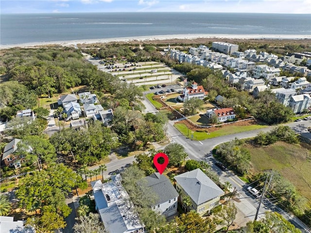 bird's eye view with a water view and a residential view