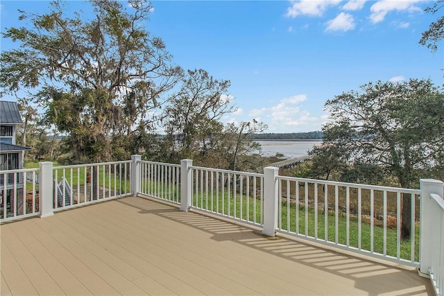 wooden terrace with a water view