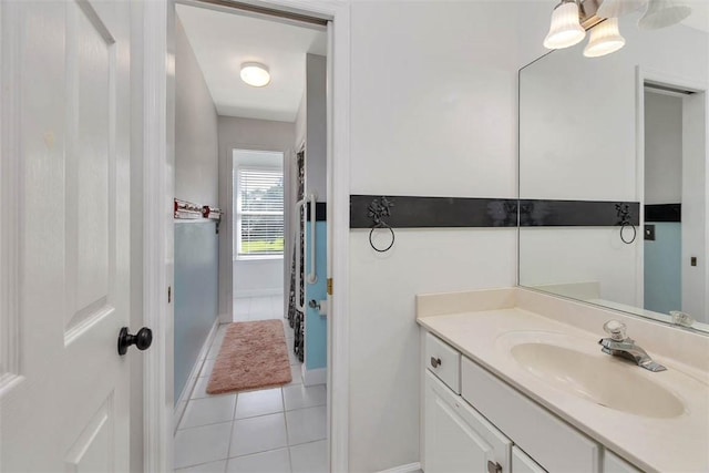 bathroom with vanity and tile patterned floors