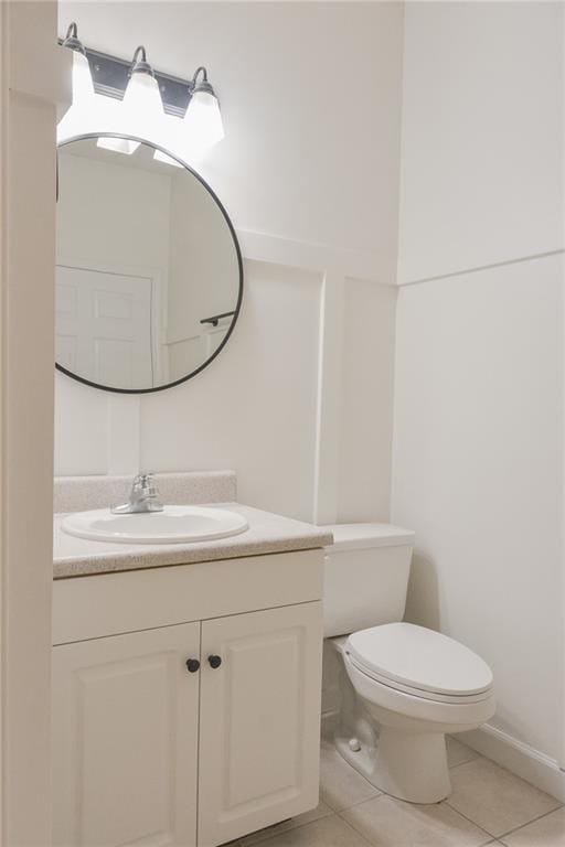 348 Moss Creek Ln, Brunswick, GA 31522 - half bath featuring vanity and tile patterned flooring