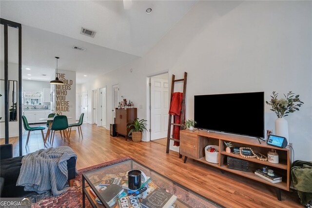 348 Moss Creek Ln, Brunswick, GA 31522 - living area with wood finished floors and recessed lighting