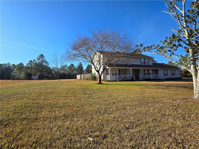 view of yard with covered porch