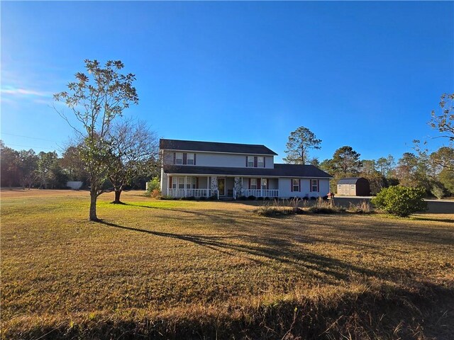 3015 Brannen Rd, Waycross, GA 31501 - view of front of home featuring covered porch and a front lawn
