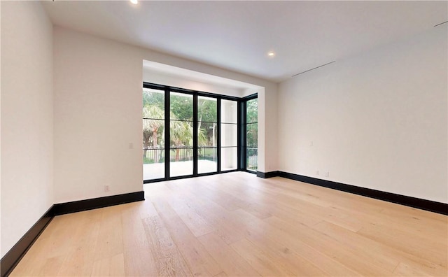 empty room featuring light wood-type flooring