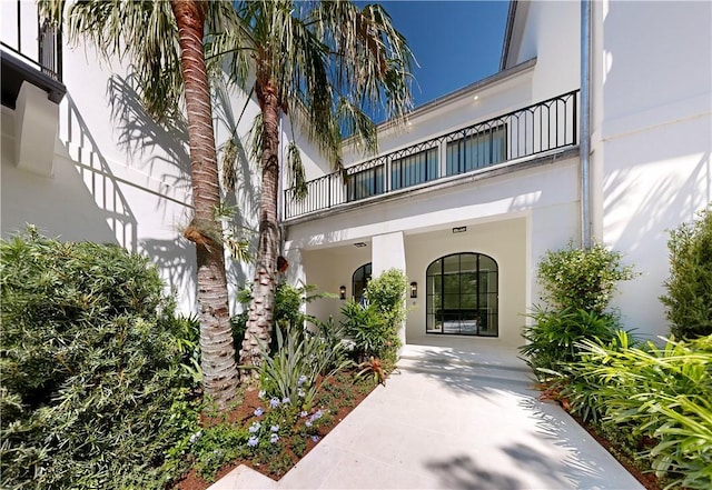 doorway to property with a balcony