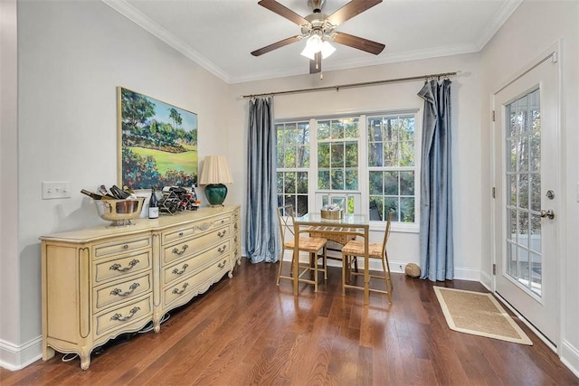 dining area with baseboards, ceiling fan, dark wood-style flooring, and crown molding