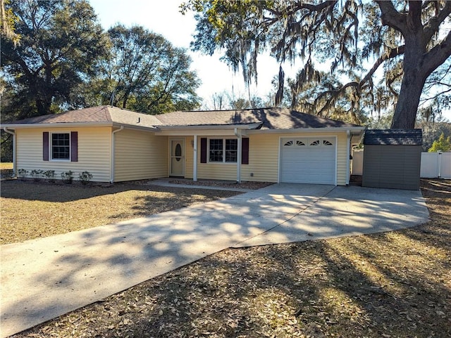 ranch-style home featuring a garage