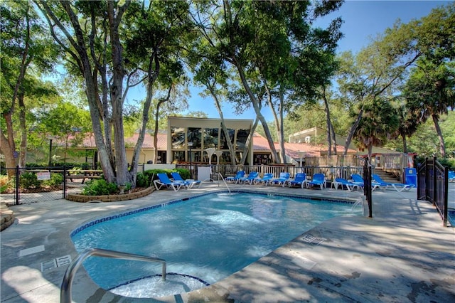 view of pool featuring a patio