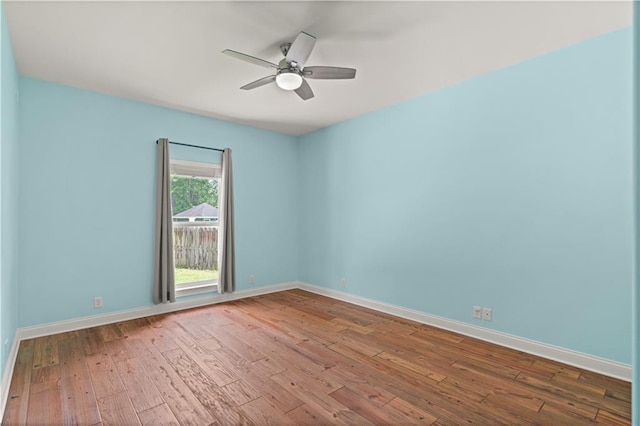 114 Wedge Wood Ct, Brunswick, GA 31525 - spare room featuring hardwood / wood-style flooring, ceiling fan, and baseboards