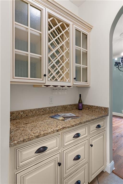 114 Wedge Wood Ct, Brunswick, GA 31525 - indoor dry bar featuring arched walkways