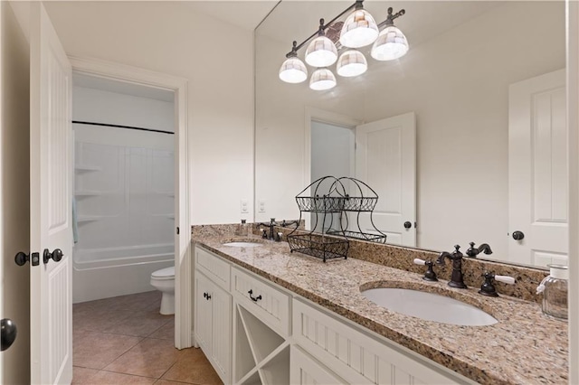 114 Wedge Wood Ct, Brunswick, GA 31525 - full bathroom with toilet, double vanity, tile patterned floors, a chandelier, and bathtub / shower combination