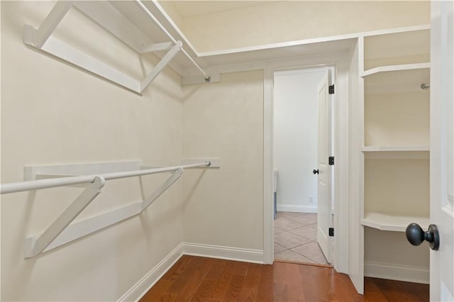 114 Wedge Wood Ct, Brunswick, GA 31525 - walk in closet featuring dark wood-type flooring
