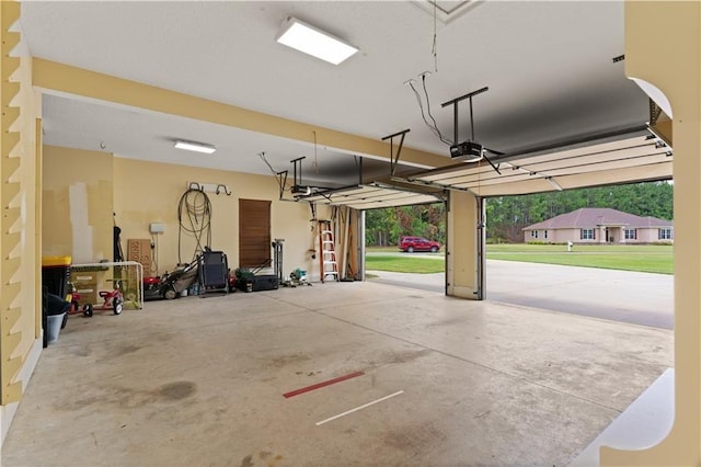 114 Wedge Wood Ct, Brunswick, GA 31525 - garage featuring a garage door opener