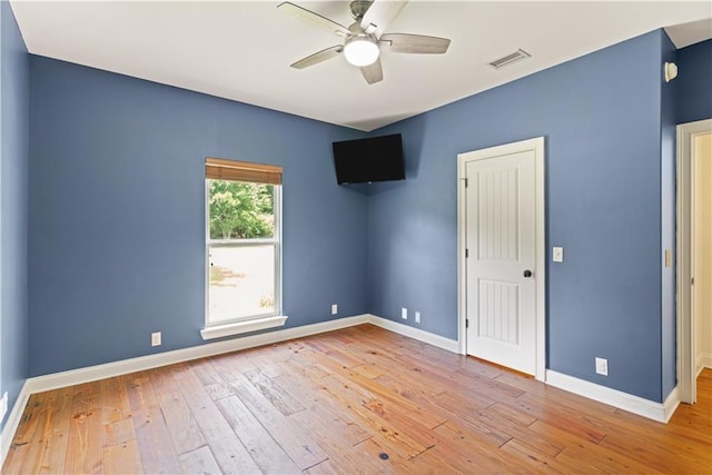 114 Wedge Wood Ct, Brunswick, GA 31525 - spare room with ceiling fan, hardwood / wood-style floors, and baseboards