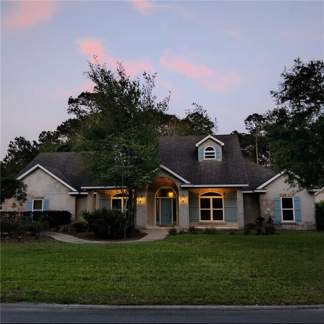 114 Wedge Wood Ct, Brunswick, GA 31525 - view of front of house with a front yard and a shingled roof