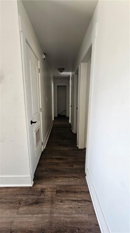 2645 Oriole St, Brunswick, GA 31520 - hallway featuring baseboards and dark wood finished floors