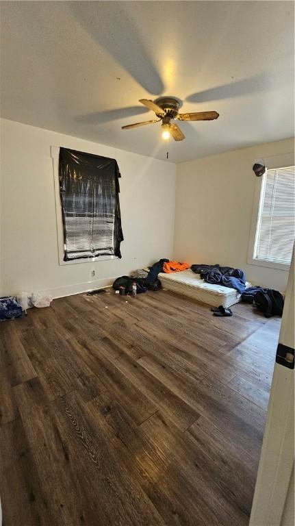 2645 Oriole St, Brunswick, GA 31520 - unfurnished bedroom featuring wood finished floors and ceiling fan