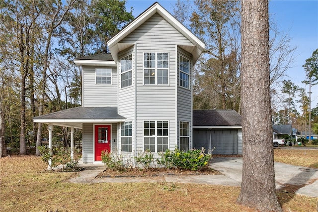 view of front facade featuring a front lawn and a porch