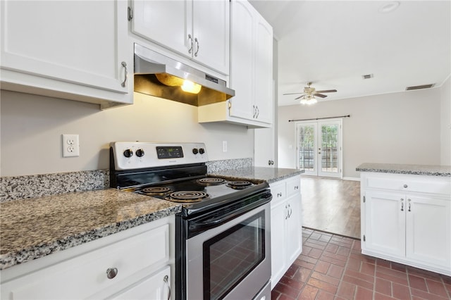 kitchen with french doors, ceiling fan, stone countertops, white cabinetry, and stainless steel electric range