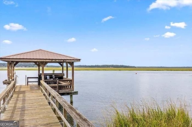 dock area featuring a water view