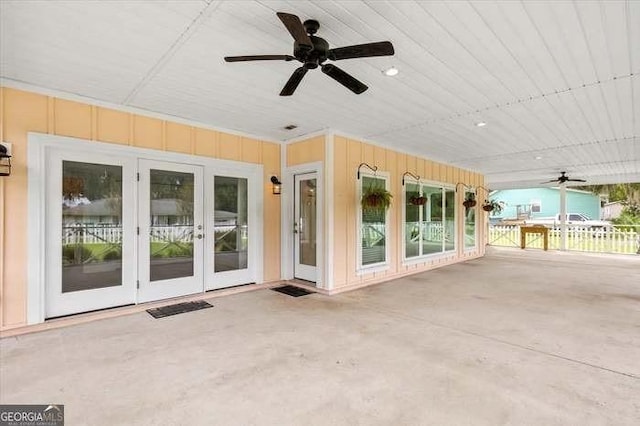 view of patio featuring french doors