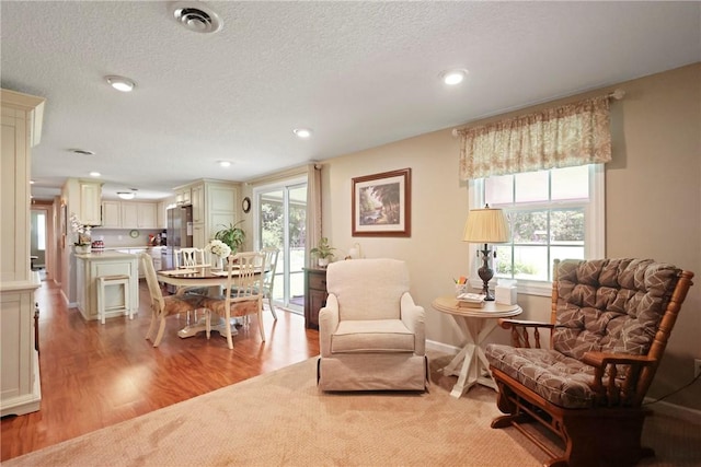 314 King David Rd, Jesup, GA 31545 - dining space featuring a textured ceiling, light wood-type flooring, and recessed lighting