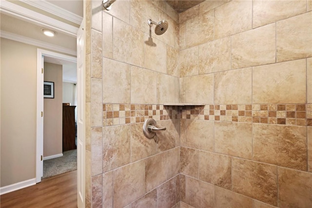 314 King David Rd, Jesup, GA 31545 - bathroom view of ornamental molding, tiled shower, and wood finished floors