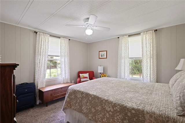 314 King David Rd, Jesup, GA 31545 - carpeted bedroom with a decorative wall and a ceiling fan