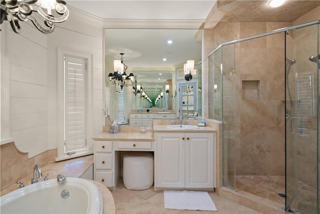 bathroom featuring an inviting chandelier, tile patterned flooring, separate shower and tub, vanity, and ornamental molding