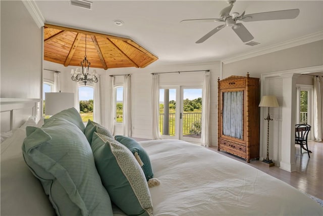 bedroom featuring vaulted ceiling, multiple windows, and wooden ceiling