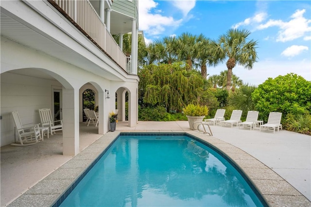 view of pool featuring a patio area