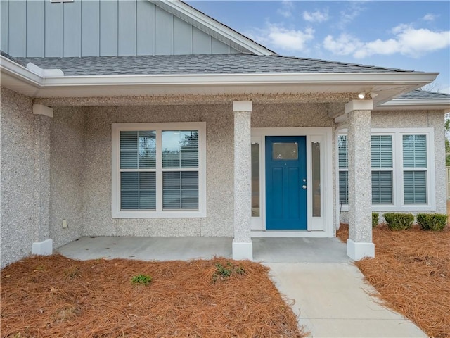 doorway to property with a porch