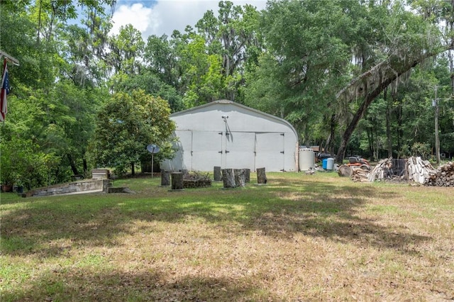 4068 3r Fish Camp Rd, White Oak, GA 31568 - view of grassy yard with an outbuilding and a pole building