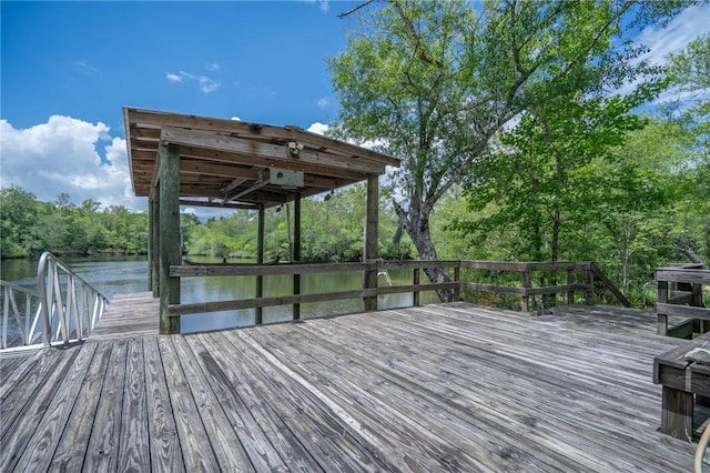 4068 3r Fish Camp Rd, White Oak, GA 31568 - dock area with a water view and view of wooded area