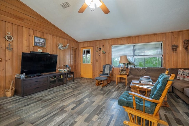 4068 3r Fish Camp Rd, White Oak, GA 31568 - living area with wood walls, a ceiling fan, lofted ceiling, and wood finished floors