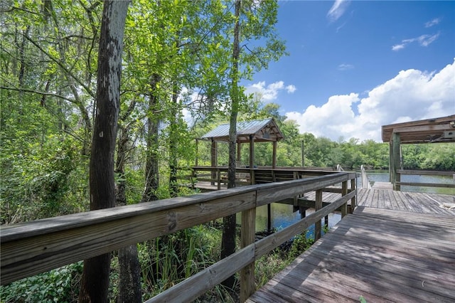 4068 3r Fish Camp Rd, White Oak, GA 31568 - dock with a gazebo and a water view