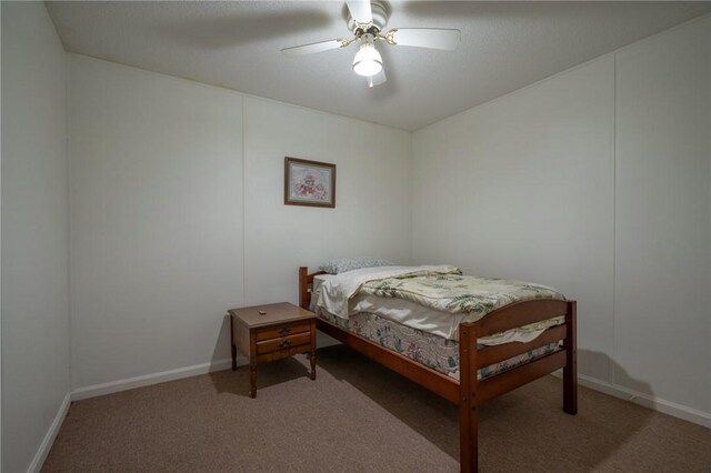 4068 3r Fish Camp Rd, White Oak, GA 31568 - bedroom featuring carpet floors, a ceiling fan, and baseboards