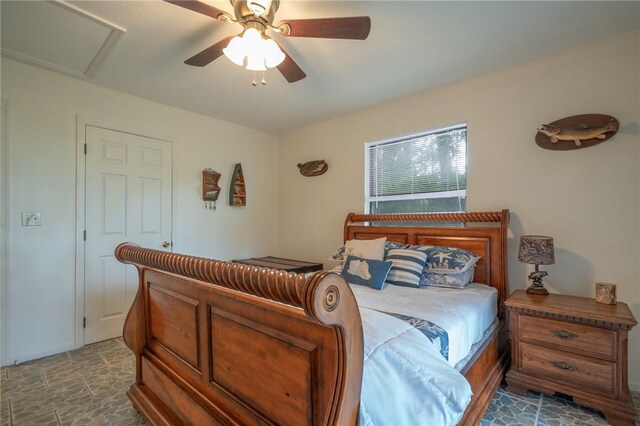 4068 3r Fish Camp Rd, White Oak, GA 31568 - bedroom featuring a ceiling fan and attic access
