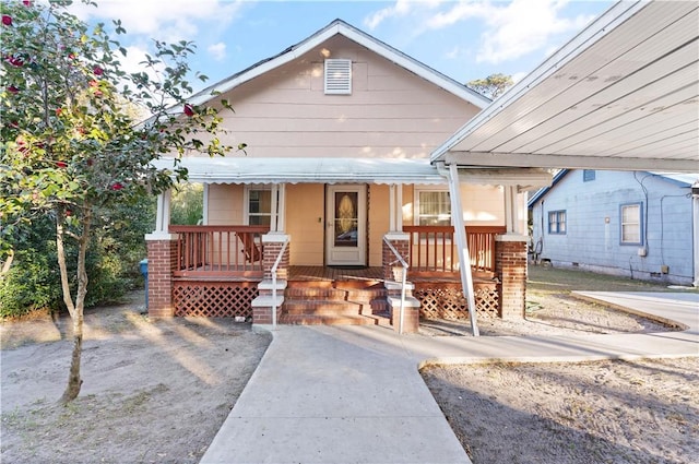 bungalow-style house with covered porch