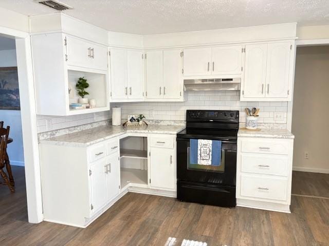 kitchen featuring dark wood-type flooring, light countertops, under cabinet range hood, and black electric range oven