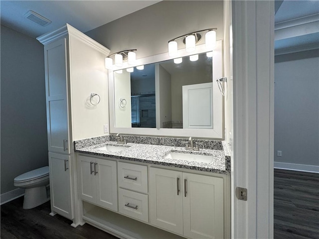 193 W Melody Dr, Jesup, GA 31545 - bathroom with wood finished floors and double vanity