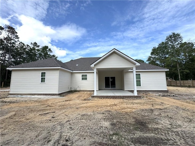 193 W Melody Dr, Jesup, GA 31545 - back of house with a patio area and a shingled roof