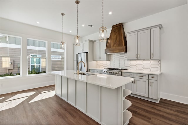 kitchen featuring dark hardwood / wood-style flooring, sink, gray cabinetry, and appliances with stainless steel finishes