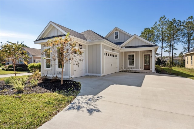 view of front of house with a porch and a garage