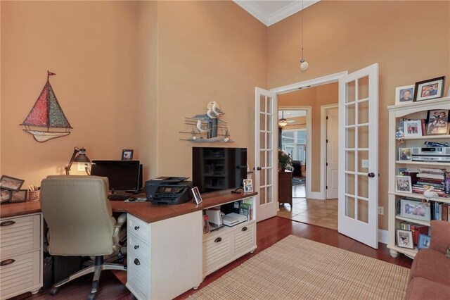 655 Littlefield St, Jesup, GA 31546 - office area featuring french doors, crown molding, and dark wood-type flooring