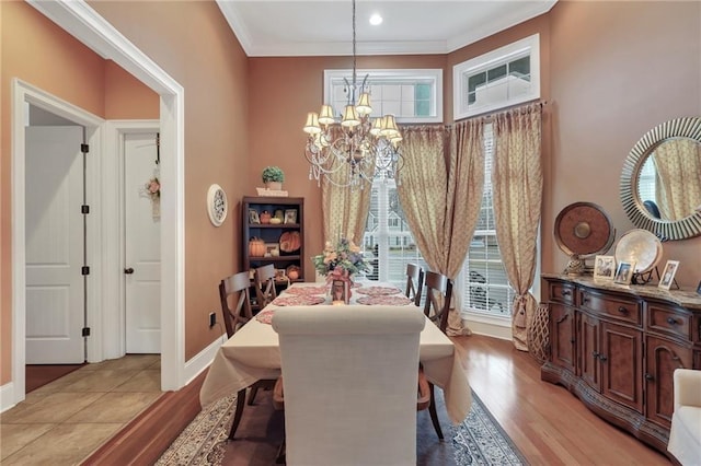 655 Littlefield St, Jesup, GA 31546 - dining area with a chandelier, crown molding, light wood finished floors, and recessed lighting
