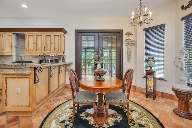265 Harbor Pointe Dr, Brunswick, GA 31523 - dining space with baseboards, a chandelier, plenty of natural light, and recessed lighting